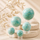 Amazonite spheres by Talk to Crystals, available in various sizes, featuring natural healing crystals for manifestation, mental clarity, hope, courage, Heart and Throat Chakra healing in India