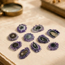 Natural Amethyst stalactite slices by Talk to Crystals, cut from stalactite formations and displaying radiating purple crystals, concentric bands and unique natural patterns