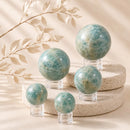 Aquamarine spheres by Talk to Crystals, available in various sizes, featuring natural healing crystals for courage, communication, emotional balance, inner peace, intuition, and Throat Chakra healing in India