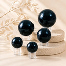 Black Tourmaline spheres by Talk to Crystals, available in various sizes, featuring natural healing crystals for protection, grounding, removing negative energy, emotional strength, and Root Chakra healing in India