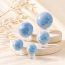 Blue Calcite spheres by Talk to Crystals, available in various sizes, featuring natural healing crystals for calmness, communication, mental clarity, emotional healing, and Throat Chakra healing in India