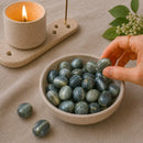 Cats Eye tumble stones by Talk to Crystals featuring natural healing crystals for protection, intuition, focus, grounding, confidence, and spiritual energy practices in India
