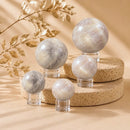 Natural Cream Moonstone spheres by Talk to Crystals for emotional balance, feminine energy, intuition, new beginnings, Crown and Sacral Chakra healing, and crystal home décor in India