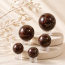 Garnet spheres by Talk to Crystals, available in various sizes, featuring natural healing crystals for passion, vitality, confidence, commitment, courage, and Root Chakra healing in India