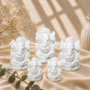 Howlite Ganesha idols by Talk to Crystals, available in various sizes, featuring natural healing crystals for calmness, patience, stress relief, restful sleep, removing obstacles, and auspicious beginnings, making meaningful spiritual and housewarming gifts in India
