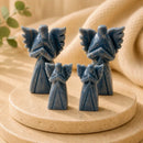 Iolite Archangel Zadkiel idol with spread wings, symbolizing mercy, protection and support for learning, memory and confidence, with Iolite enhancing intuition, clairvoyance and creative expression.