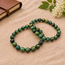 Kambaba Jasper crystal bracelet with natural green and black orbicular stone beads, polished gemstone stretch bracelet by Talk to Crystals.