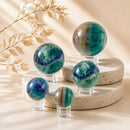 Multi-Fluorite spheres by Talk to Crystals, available in various sizes, featuring natural healing crystals for mental clarity, focus, learning, intuition, spiritual growth, and energy balance in India