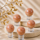Orange Aventurine spheres by Talk to Crystals, available in various sizes, featuring natural healing crystals for confidence, creativity, motivation, optimism, and Sacral Chakra healing in India.