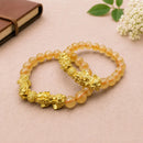 Natural Citrine Pixiu bracelet by Talk to Crystals for wealth, abundance, prosperity, success, manifestation and positive energy, combining Citrine with the traditional wealth-attracting Pixiu symbol