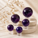 Purple Fluorite spheres by Talk to Crystals, available in various sizes, featuring natural healing crystals for intuition, mental clarity, spiritual growth, focus, and Third Eye Chakra healing in India
