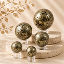 Pyrite spheres by Talk to Crystals, available in various sizes, featuring natural healing crystals for wealth, abundance, prosperity, recognition, success, and Solar Plexus Chakra healing in India