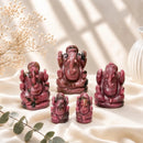 Rhodonite Ganesha idols by Talk to Crystals, available in various sizes, featuring natural healing crystals for emotional healing, forgiveness, self-worth, relationship harmony, compassion, removing obstacles, and auspicious beginnings, making meaningful spiritual and housewarming gifts in India