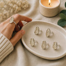 Libyan Desert Glass by Talk to Crystals featuring unique natural rough tektites, with each piece one of a kind, prized for personal transformation, manifestation, joy, Solar Plexus Chakra healing, and spiritual growth in India