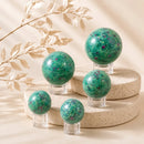 Ruby Fuchsite spheres by Talk to Crystals, available in various sizes, featuring natural healing crystals for emotional healing, vitality, compassion, unconditional love, and Heart Chakra healing in India