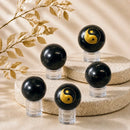 Shungite spheres by Talk to Crystals, available in various sizes, featuring natural healing crystals for EMF protection, purification, grounding, and Root Chakra healing in India