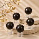 Star Garnet spheres by Talk to Crystals, available in various sizes, featuring natural healing crystals for intuition, protection, grounding, inner strength, resilience, and Root Chakra healing in India