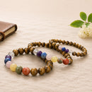 Natural Tiger Eye bracelet with Seven Chakra gemstone beads by Talk to Crystals for confidence, protection, courage, chakra balancing, grounding and personal power