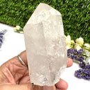 Clear Quartz Point on stand from Brazil