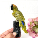 Crystal Parrots on Tall Crystal Logs