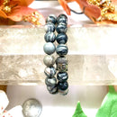 Black Picasso Jasper Round Bead Bracelet (Nurturing and Optimism)